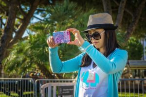 woman taking pictures of a bicycle accident