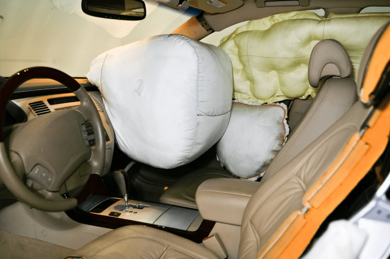 airbag being deployed in a car