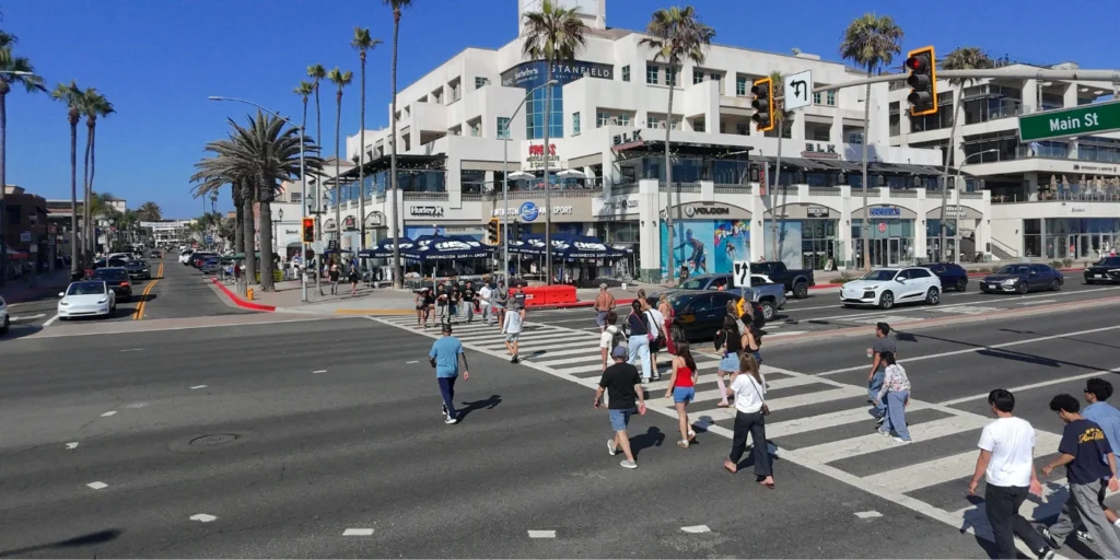 Marked crosswalk at the intersection of PCH and Main Street near the Huntington Beach pier 