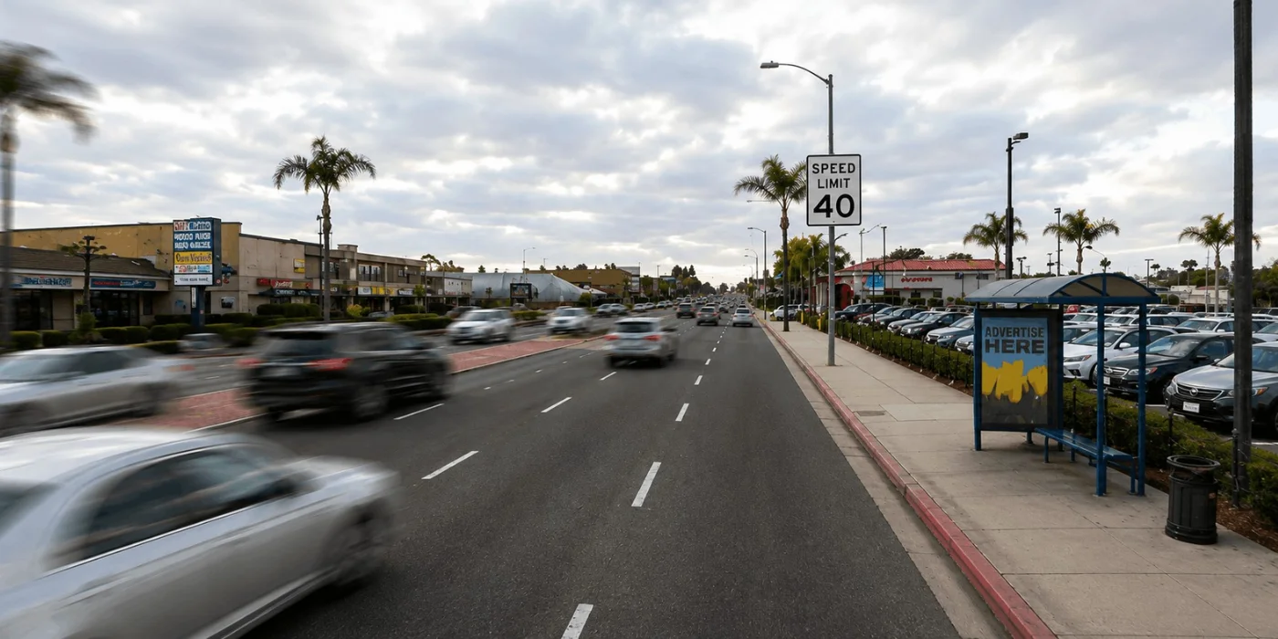 Speed limit sign on Beach Blvd in Huntington Beach with fast-moving traffic creating a blur effect.